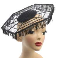 Filigree spider web hat with fringes